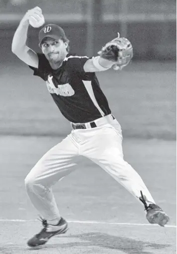  ?? [LIZ BEVAN / THE OBSERVER] ?? Pitcher Dylan Lebold winds up to pitch a strike at the U18 Twin Centre Wildcats game on Tuesday night. The team is heading to nationals in Saskatoon next month.