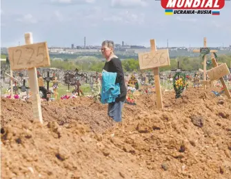  ?? REUTERS ?? Un cementerio en Mariúpol fue habilitado para los cuerpos, víctimas de la guerra