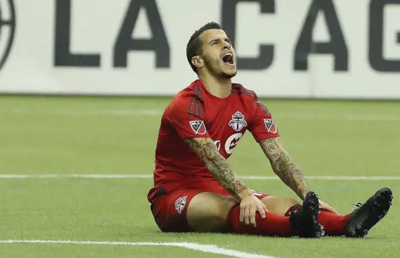  ?? STEVE RUSSELL/TORONTO STAR ?? Toronto FC forward Sebastian Giovinco screams in frustratio­n after missing a shot against the Impact. Montreal jumped out to a 3-0 lead at home before the Reds rallied late.