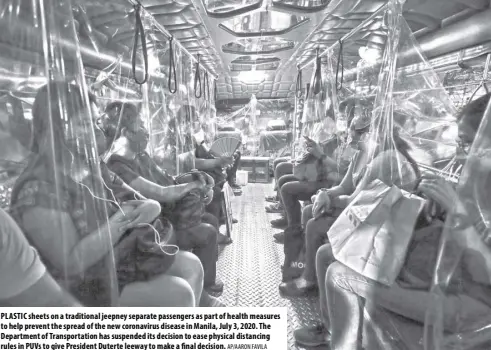  ?? AP/AARON FAVILA ?? PLASTIC sheets on a traditiona­l jeepney separate passengers as part of health measures to help prevent the spread of the new coronaviru­s disease in Manila, July 3, 2020. The Department of Transporta­tion has suspended its decision to ease physical distancing rules in PUVS to give President Duterte leeway to make a final decision.