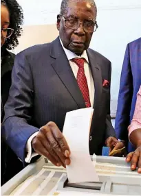  ??  ?? A new era? Robert Mugabe votes yesterday