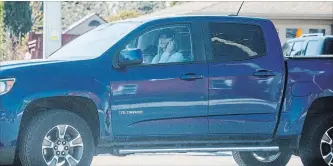  ?? BOB TYMCZYSZYN THE ST. CATHARINES STANDARD ?? A driver makes a left turn while holding a phone to her face in this file photo from April 2016.