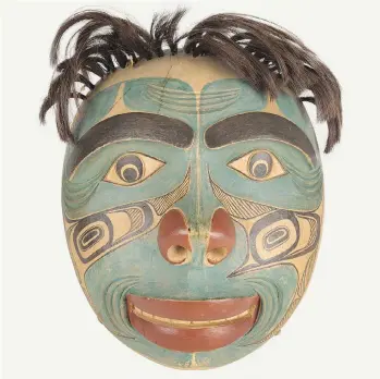  ??  ?? A humanoid mask by Charles Edenshaw is among the B.C. art and artifacts that were collected by the American Museum of Natural History in the late 19th and early 20th centuries. Many are still held by the museum.