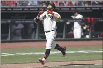  ?? NHAT V. MEYER — BAY AREA NEWS GROUP FILE ?? The San Francisco Giants’ Brandon Crawford celebrates his two-run home run on the way to home plate against the San Diego Padres in the seventh inning at Oracle Park in San Francisco on Sept. 27.