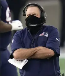  ?? CHARLES KRUPA ?? New England Patriots head coach Bill Belichick watches from the sideline in the first half of an NFL football game against the San Francisco 49ers, Sunday, Oct. 25, 2020, in Foxborough, Mass.