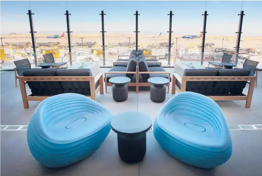  ?? DENVER INTERNATIO­NAL AIRPORT VIA THE NEW YORK TIMES ?? An outdoor deck with views of the Rocky Mountains at the new Concourse B-West at Denver Internatio­nal Airport.