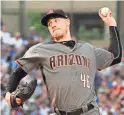  ?? MATT MARTON/USA TODAY SPORTS ?? Diamondbac­ks starter Patrick Corbin delivers in the first inning on Monday.