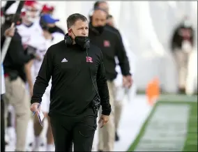  ?? JULIO CORTEZ — THE ASSOCIATED PRESS FILE ?? In this Dec. 12, 2020, file photo, Rutgers head coach Greg Schiano looks on during the second half of an NCAA college football game against Maryland in College Park, Md. Schiano is kicking off the second season of his second stint at Rutgers with another first this time around. The Scarlet Knights are going to play host to Temple on Thursday night in a home game that will have no restrictio­n on fans.