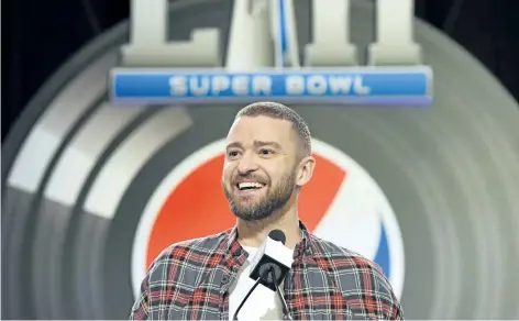  ?? TIMOTHY A. CLARY/ GETTY IMAGES ?? Justin Timberlake speaks during a Super Bowl press conference on Thursday in Minneapoli­s, Minn. Timberlake has ruled out any guests like ’ N Sync or Janet Jackson during his halftime performanc­e on Sunday.