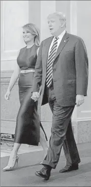  ?? NYT ?? US President Donald Trump and first lady Melania Trump arrive at the Colon Theater for an event during the G-20 summit in Buenos Aires on Friday.