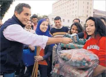  ?? Sarkasmos Production­s ?? BASSEM YOUSSEF, shown in the documentar­y “Tickling Giants”: “I love sarcasm” to cut through facades.