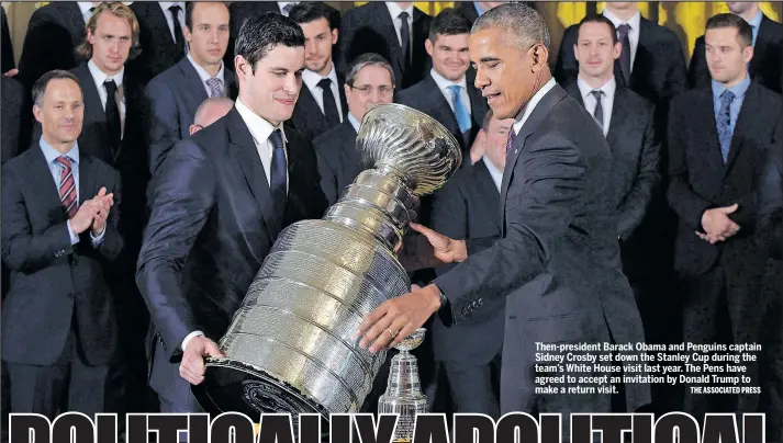  ?? THE ASSOCIATED PRESS ?? Then-president Barack Obama and Penguins captain Sidney Crosby set down the Stanley Cup during the team’s White House visit last year. The Pens have agreed to accept an invitation by Donald Trump to make a return visit.