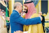  ?? Photo: AP ?? Turkish President Recep Tayyip Erdogan is greeted with a hug by Saudi Arabia’s Crown Prince Mohammed bin Salman in Jeddah.