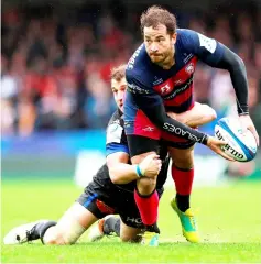  ??  ?? Gloucester’s Danny Cipriani (right) in action with Castres’ Florian Vialelle. — Reuters photo