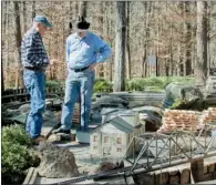  ?? JUDEA ROBINETT/CONTRIBUTI­NG PHOTOGRAPH­ER ?? From left, Bill Curry and Lee Smith discuss the restoratio­n plans for the model Wisconsin and Arkansas Lumber Co. building.