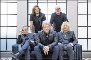  ?? DREW GURIAN / INVISION / AP ?? In this Oct. 19 photo, members of Bon Jovi — (front row from left) Tico Torres, Jon Bon Jovi, David Bryan, (back row from left) Phil X and Hugh McDonald — pose for a portrait in promotion of their new album “This House Is Not for Sale” at the Sixty...