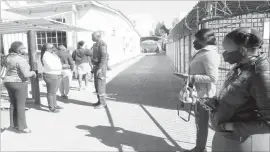  ??  ?? Some of the Zimpapers Bulawayo Branch staff queue to get tested for Covid-19 yesterday