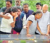  ??  ?? From right: Gauri Lankesh 's brother Indrajit, mother Indira and sister Kavitha at her funeral in Bengaluru on Wednesday.