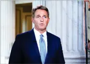  ?? AP PHOTO BY MANUEL BALCE CENETA ?? Sen. Jeff Flake, R-ariz., speaks during a television interview on Capitol Hill in Washington, Tuesday.