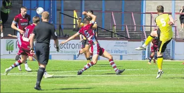  ?? Picture: David Couldridge ?? Sonny Miles fires home Tonbridge’s second goal at Weymouth on the way to a 3-1 success