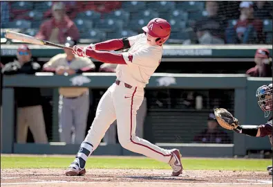  ?? NWA Democrat-Gazette/ANDY SHUPE ?? Arkansas freshman Heston Kjerstad hit a long home run during the second inning of the Razorbacks’ 4-0 victory over Louisiana-Monroe on Wednesday at Baum Stadium. Radar tracking at the stadium measured the home run at 430 feet.