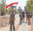  ?? FOTO: AFP ?? Irakische Soldaten feiern die Einnahme der Stadt Tal Afar.