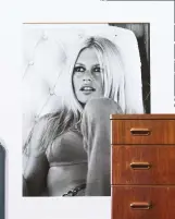  ??  ?? ABOVE Most of the striking fashion prints in this home were taken by John, but this iconic Brigitte Bardot print from Rockett St George, £ 46, evokes a similar feel Add a sweep of dramatic colour with ‘Railings’ Estate Emulsion, £ 43.50 for 2.5l, from...