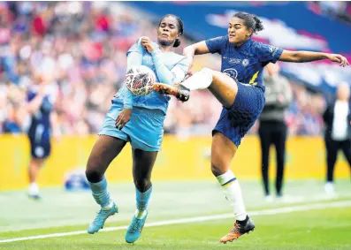  ?? AP ?? Manchester City’s Jamaican forward Khadija Shaw (left) and Chelsea’s Jessica Carter battle for the ball during the Women’s FA Cup final at Wembley Stadium, London yesterday.
