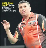  ??  ?? MORE THAN HANDY Suljovic on his way to a memorable victory last night