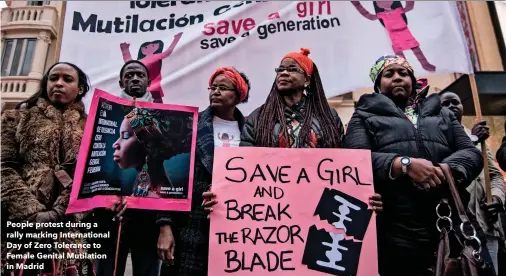  ??  ?? People protest during a rally marking Internatio­nal Day of Zero Tolerance to Female Genital Mutilation in Madrid