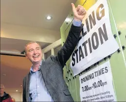  ??  ?? THUMBS UP Farron was thinking positive as he cast his vote in Lake District