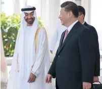  ??  ?? Sheikh Mohamed bin Zayed bids farewell to Xi Jinping after a reception at the Presidenti­al Palace.