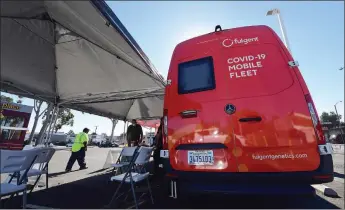  ?? Frederic J. Brown / AFP / Getty Images /TNS ?? A man walks toward the check-in for the COVID-19 vaccine at a pop up clinic offering vaccines and booster shots in Rosemead on Nov. 29.