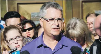  ?? CP ?? Greg Perras, the father of victim Kaitlin Perras, reads a statement outside the courtroom Monday.