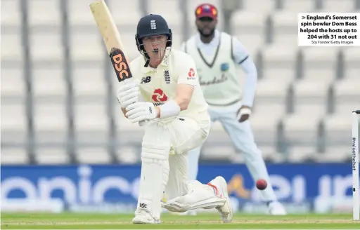  ?? Stu Forster/Getty Images ?? England’s Somerset spin bowler Dom Bess helped the hosts up to
204 with 31 not out