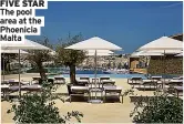  ?? ?? FIVE STAR The pool area at the Phoenicia Malta