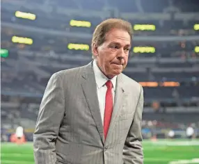  ?? JEFFREY MCWHORTER/AP ?? Alabama coach Nick Saban walks off the field before the Cotton Bowl against Cincinnati on Dec. 31 in Arlington, Texas.