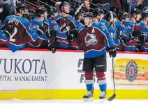  ?? JACK DEMPSEY/THE ASSOCIATED PRESS ?? Nathan MacKinnon has propelled the Colorado Avalanche to a remarkable turnaround, but they may need to make the playoffs if he is to have a shot at winning the Hart Trophy.