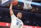  ?? JOE RONDONE/THE COMMERCIAL APPEAL ?? Memphis Tigers forward D.J. Jeffries tries to dunk against Jackson State during their game at the Fedexforum on Dec. 21, 2019.