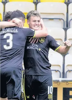  ??  ?? Opener Danny Mullen celebrates his goal