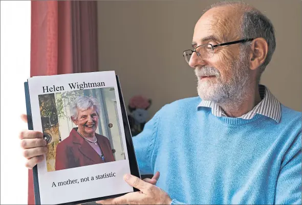  ?? Picture: Dougie Nicolson. ?? “Thrown out of the lifeboat”: Alan Wightman with a picture of his mother Helen reading “a mother, not a statistic”.