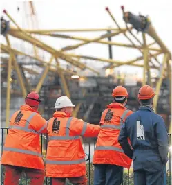  ?? Picture: PA. ?? Workers overlook the BiFab yard at Methil as unions pledge to keep fighting for the jobs there and in Burntislan­d, despite redundancy notices being issued to workers.