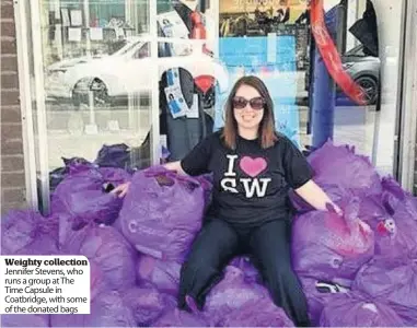  ??  ?? Weighty collection Jennifer Stevens, who runs a group at The Time Capsule in Coatbridge, with some of the donated bags