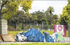  ?? Mel Melcon Los Angeles Times ?? A HOMELESS encampment sits next to the VA West Los Angeles Campus.