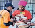  ?? ?? GBVF monitors distribute­d pamphlets containing informatio­n about domestic violence.