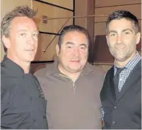  ?? MEAT MARKET/COURTESY ?? Emeril Lagasse, center, with chef Sean Brasel, left, and general manager Sebastien Tribout, during a taping at Meat Market restaurant in Miami Beach.