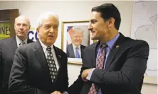  ?? Rich Pedroncell­i / Associated Press ?? Republican gubernator­ial candidate John Cox (center) was the target of a roundabout attack ad linking him to Democrats.