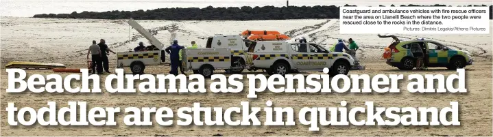  ?? Pictures: Dimitris Legakis/Athena Pictures ?? Coastguard and ambulance vehicles with fire rescue officers near the area on Llanelli Beach where the two people were rescued close to the rocks in the distance.