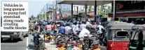 ??  ?? Vehicles in long queues to pump fuel stretched along roads creating traffic blocks