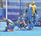  ??  ?? India players wait for a video referral against Belgium.